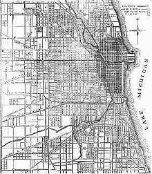 A streetmap of land adjacent to an area marked as Lake Michigan, with a central portion of the map shaded grey.