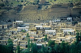 Taşkale village with the caves in the background