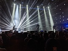 Landscape photo depicting Interpol playing in concert in Pittsburgh, Pennsylvania