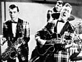 Image 15Bill Haley and his Comets performing in the 1954 Universal International film Round Up of Rhythm (from Rock and roll)