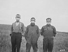 Albertan farmers wore masks to protect themselves from the flu.