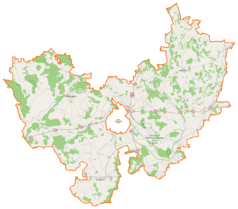 Mapa konturowa powiatu łomżyńskiego, blisko centrum po prawej na dole znajduje się punkt z opisem „Rakowo-Czachy”