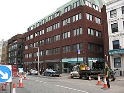 John Harvard Library occupies part of a 5-storey building on a main road