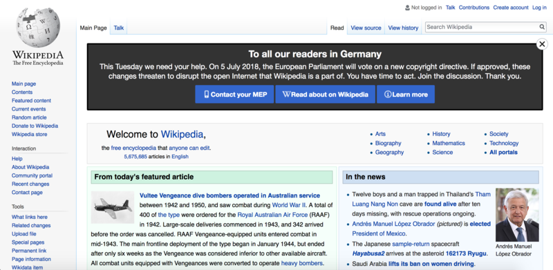 Screenshot of the top-half of the English Wikipedia main page with the banner "To all our readers in Germany" at the top