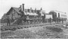 Canada Southern locomotive number 337 with a passenger train at Comber Station in the late 19th century