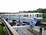 1000系（初期車・側面方向幕設置済、万博記念公園駅付近）