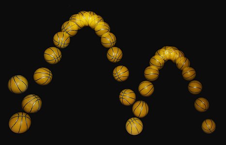 A bouncing ball captured with a stroboscopic flash at 25 images per second. The ball becomes significantly non-spherical after each bounce, especially after the first. That, along with spin and air resistance, causes the curve swept out to deviate slightly from the expected perfect parabola.