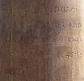 The Ashoka inscription on the pillar today.