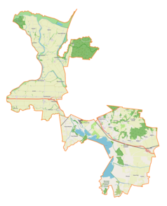 Mapa konturowa gminy wiejskiej Elbląg, na dole nieco na prawo znajduje się owalna plamka nieco zaostrzona i wystająca na lewo w swoim dolnym rogu z opisem „Druzno”