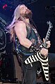 Zakk Wylde plays a Flying V with his signature bullseye paint job in 2006 with Black Label Society