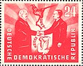 Image 21951 East German stamp commemorating the Treaty of Zgorzelec establishing the Oder-Neisse line as a "border of peace", featuring the presidents Wilhelm Pieck (GDR) and Bolesław Bierut (Poland) (from History of East Germany)