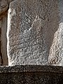 Faint, if not unrecognizable remnants of what seems to be a throne of an Elamite king. Sassanid Empire reliefs eliminated the Elamite remnants