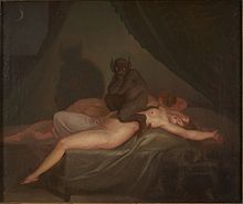 Tableau représentant un démon de couleur noire, poilu, aux yeux rouges, oreilles pointues dressées et queue, assis à califourchon sur le ventre d'une femme nue et endormie, étendue sur le dos sur son lit, contre un deuxième corps.