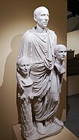 The so-called "Togatus Barberini", a statue depicting a Roman senator holding portrait effigies (possibly imagines) of deceased ancestors; marble, late 1st century BC; head (not belonging): mid 1st century BC.