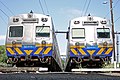 Two Hitachis in Metro Trains Melbourne livery, stabled near North Melbourne, December 2009