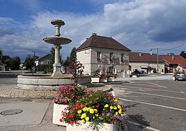 The town hall and fountain in Andelot-en-Montagne