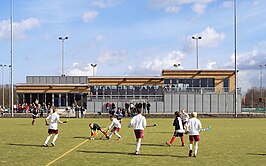 Uitzicht vanaf veld 3 op het clubhuis