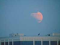 Eclipse al atardecer tomado en Roma, Italia.