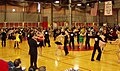 Image 3Intermediate level international-style Latin dancing at the 2006 MIT ballroom dance competition. A judge stands in the foreground. (from Culture of Latin America)