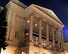 exterior shot of a classical facade of a large building