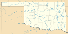 Mapa konturowa Oklahomy, na dole nieco na prawo znajduje się punkt z opisem „Thackerville”