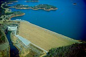 Buford Dam, depicting its steep slope of grass