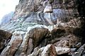 A panorama of the Behistun inscription. Note that the relief inscription is 300 feet off the ground