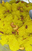 Typical Karnataka style lemon coloured Kesari bhath with cashew nuts