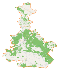 Mapa konturowa powiatu biłgorajskiego, blisko centrum u góry znajduje się punkt z opisem „Wola Radzięcka”