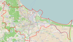 Mapa konturowa Gdańska, w centrum znajduje się punkt z opisem „Pomnik Poległych Stoczniowców 1970”