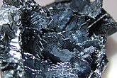 shiny black crystalline flakes