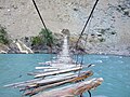 Primitive suspension bridge over the River Astore