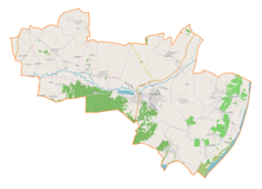 Mapa konturowa gminy Koprzywnica, w centrum znajduje się punkt z opisem „Cmentarz żydowski w Koprzywnicy”