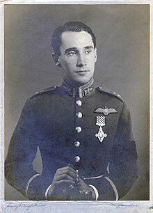 Quill, a young man, in military dress uniform: he wears a single "pip" on his shoulder and the Air Force Cross beneath his pilot's wings on his chest.