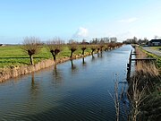 Het Westerwijtwerdermaar naar het Damsterdiep gezien vanaf het verlaat