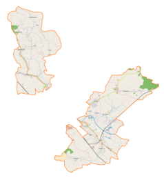 Mapa konturowa gminy wiejskiej Jarosław, w centrum znajduje się punkt z opisem „Koniaczów”