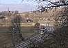 A Manchester Metrolink tram between Newhey and Shaw in 2013