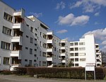 Panzerkreuzer apartment building, a white four storey apartment complex