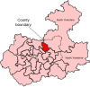 A very large constituency. It consists of the eastern portion of the county. It also includes the entirety of a second, smaller county, located to the east of the larger county.