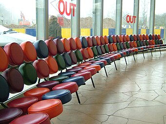 Mid-century modern - Marshmallow sofa, by Irving Harper for George Nelson Associates, 1956, metal frame with round discs of covered foam, unknown location[79]