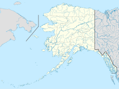 Mapa konturowa Alaski, blisko prawej krawiędzi nieco na dole znajduje się punkt z opisem „Juneau”