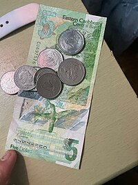 Itä-Karibian dollarin seteli ja kolikoita