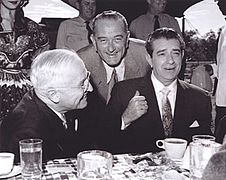 U.S. Senate Majority Leader Lyndon B. Johnson and former U.S. President Harry S. Truman having dinner with Mexican President Adolfo López Mateos in 1959.