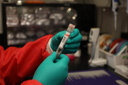 A laboratory technician at the Center for Military Psychiatry and Neuroscience at the U.S. Army Medical Research and Development Command’s Walter Reed Army Institute of Research prepares a blood sample collected from a burn patient for analysis....