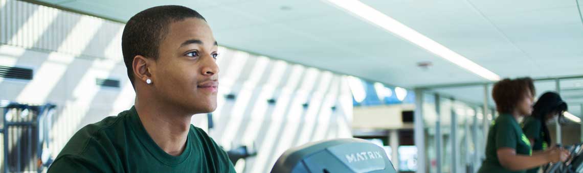 student on gym equipment