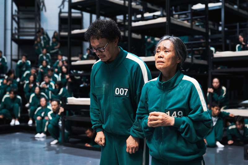 Yang Dong-geun as Park Yong-sik and Kang Ae-sim as Jang Geum-ja show nervous expressions in 'Squid Game' Season 2 