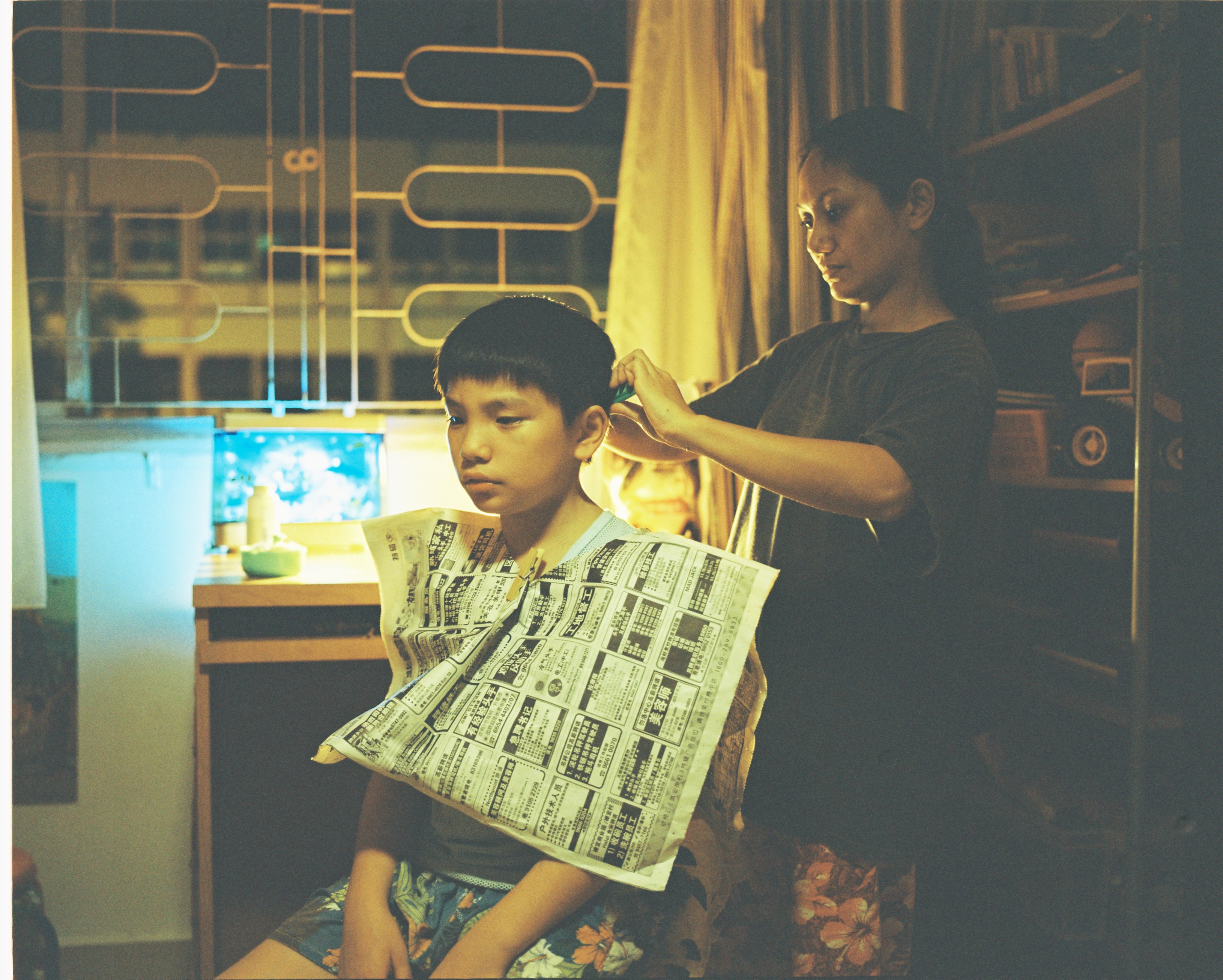 Angeli Bayani and Jia Ler Koh in Ilo Ilo (2013)