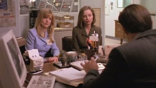 Calista Flockhart and Courtney Thorne-Smith in Ally McBeal (1997)