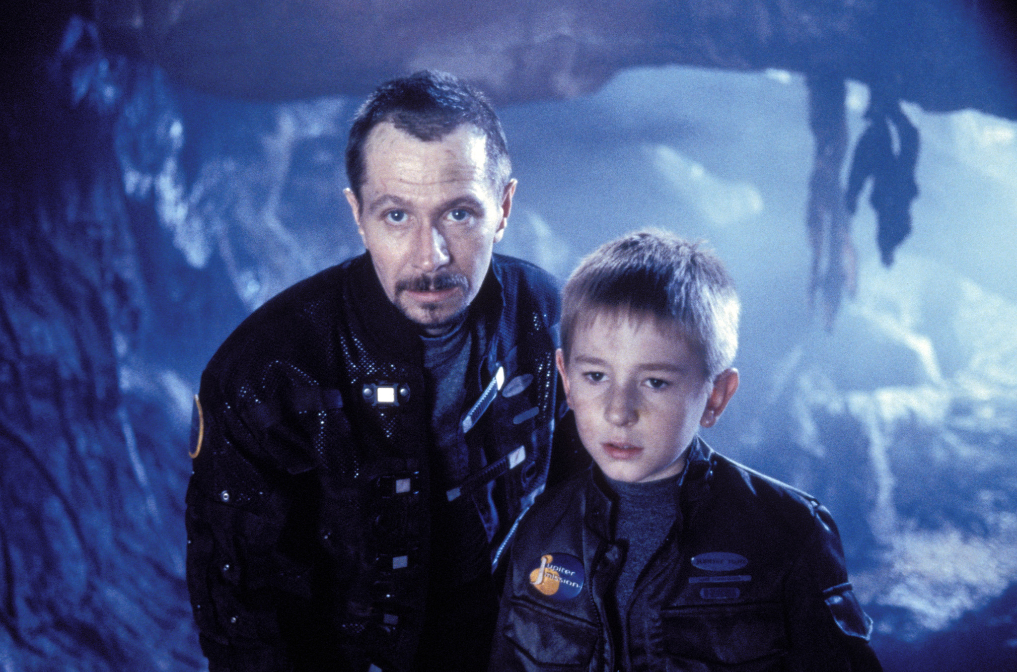 Gary Oldman and Jack Johnson in Lost in Space (1998)