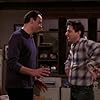 Brad Garrett and Ray Romano in Everybody Loves Raymond (1996)